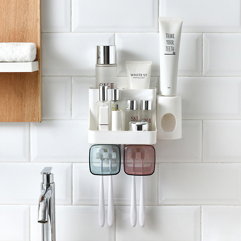 Wall-mounted toothbrush holder with 2 cups, small shelf and toothpaste dispenser